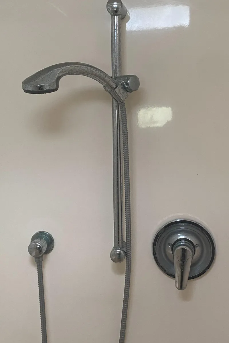 Slide: The Image of Shower fixture in a 2003 Leopard 38 yacht bathroom. - 44