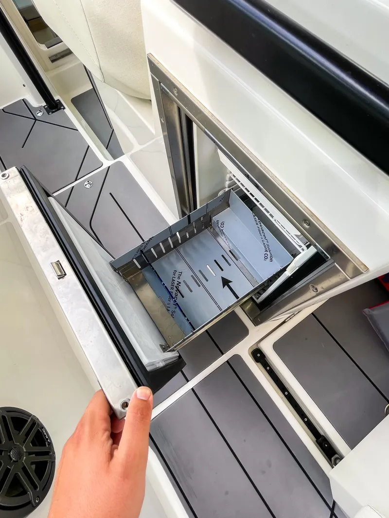 Slide: The Image of 2024 Saxdor 320 GTO interior storage compartment with sleek design and modern features. - 16