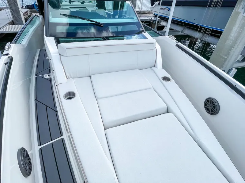 Slide: The Image of 2024 Saxdor 320 GTO boat with sleek white seating and modern design. - 3