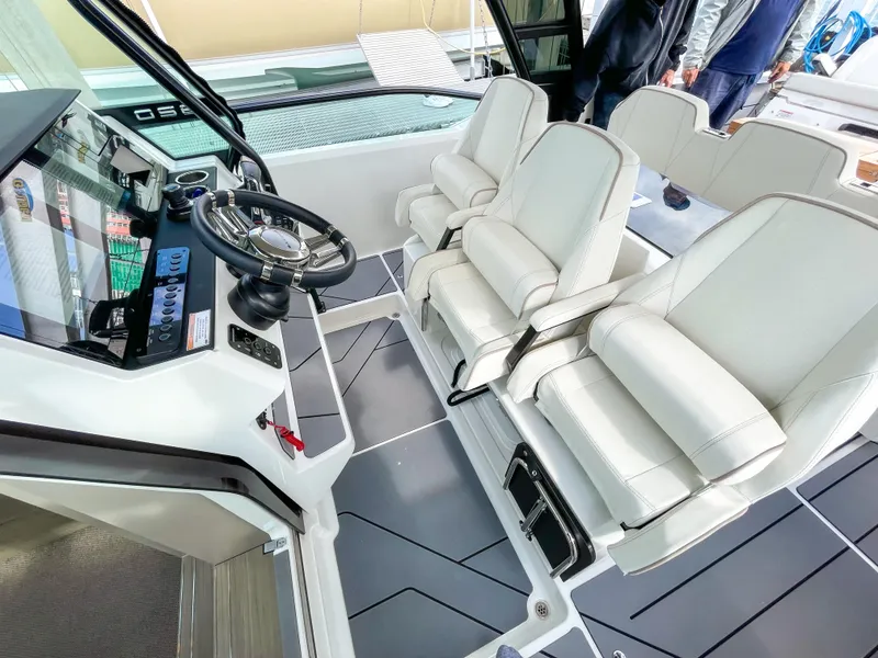 Slide: The Image of 2024 Saxdor 320 GTO interior with modern helm and luxurious seating. - 6