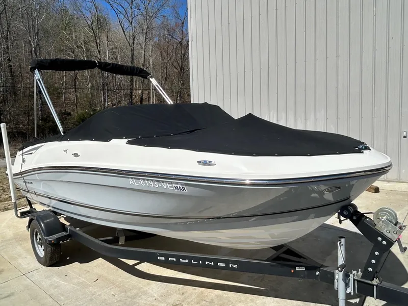 Slide: The Image of 2017 Bayliner VR5 boat on trailer with cover, parked outdoors. - 10
