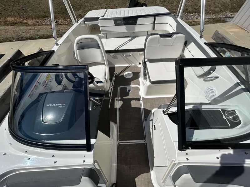 Slide: The Image of 2017 Bayliner VR5 boat interior with seating and steering wheel, showcasing modern design. - 6