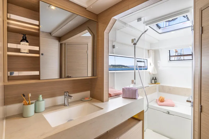 Slide: The Image of Luxurious bathroom interior of 2025 Lagoon 43 yacht with modern fixtures and natural light. - 40
