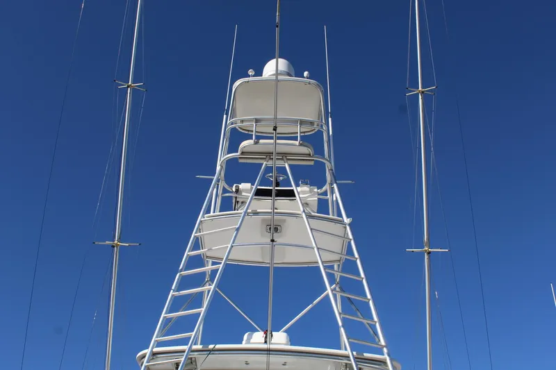 Slide: The Image of Hatteras 50' Convertible 2005 yacht tower against clear blue sky. - 19