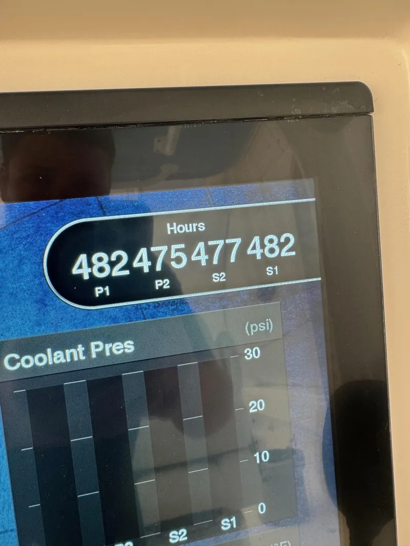 Slide: The Image of Display screen showing engine hours on a 2020 Invincible 40 Catamaran. - 16