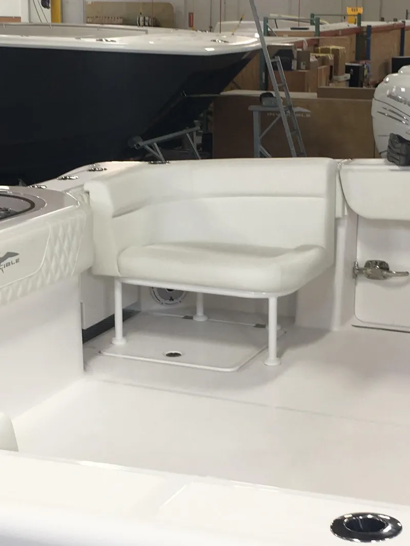 Slide: The Image of 2020 Invincible 40 Catamaran interior with white seating and sleek design. - 19