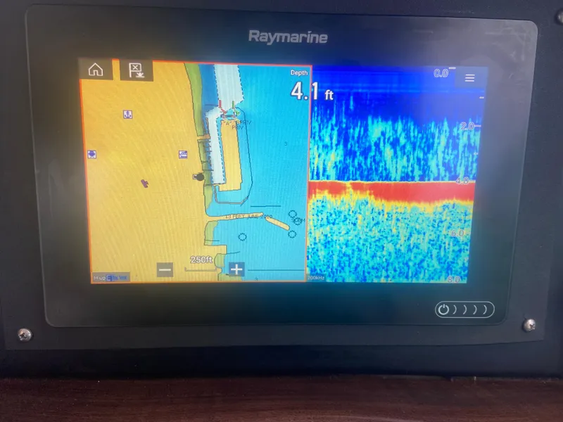 Slide: The Image of Raymarine navigation display on 2018 Four Winns V355, showing depth and sonar readings. - 16