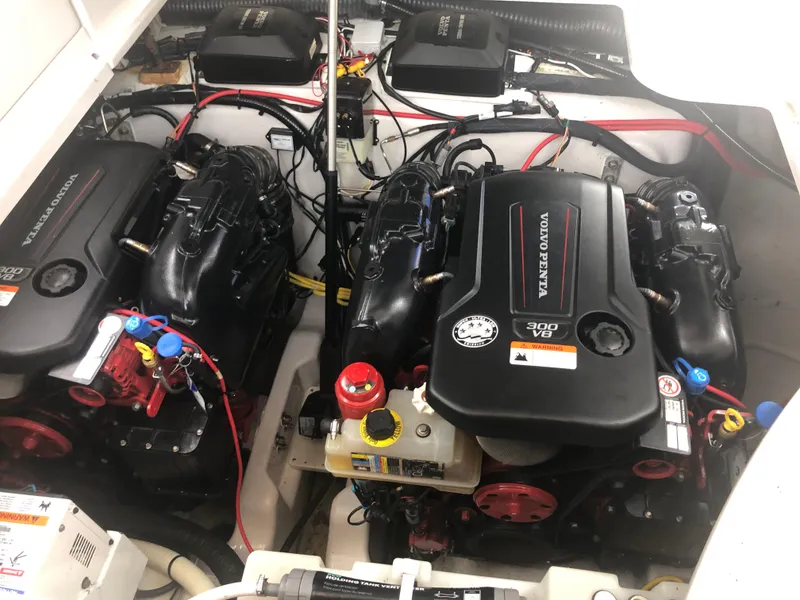 Slide: The Image of Engine compartment of a 2018 Four Winns V355 boat with dual Volvo Penta engines. - 33