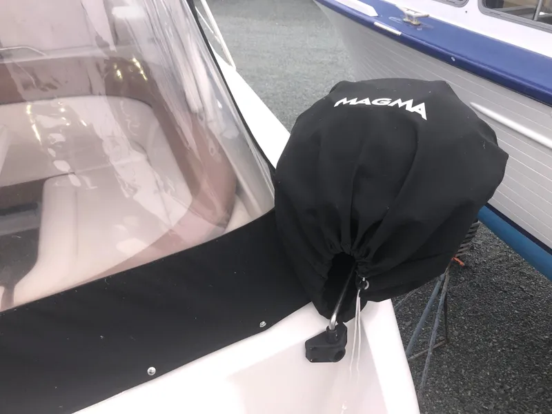 Slide: The Image of 2018 Four Winns V355 boat with Magma grill cover on deck. - 40