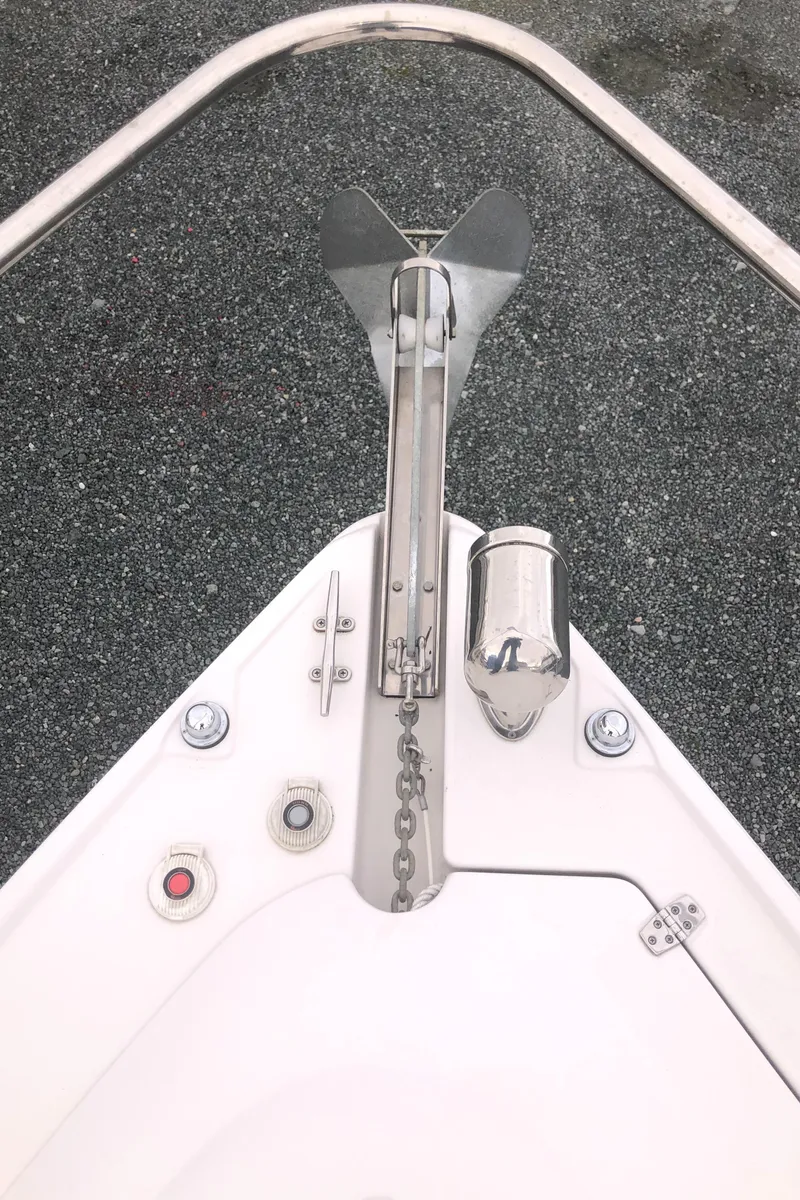 Slide: The Image of 2018 Four Winns V355 boat anchor and chain on deck. - 41