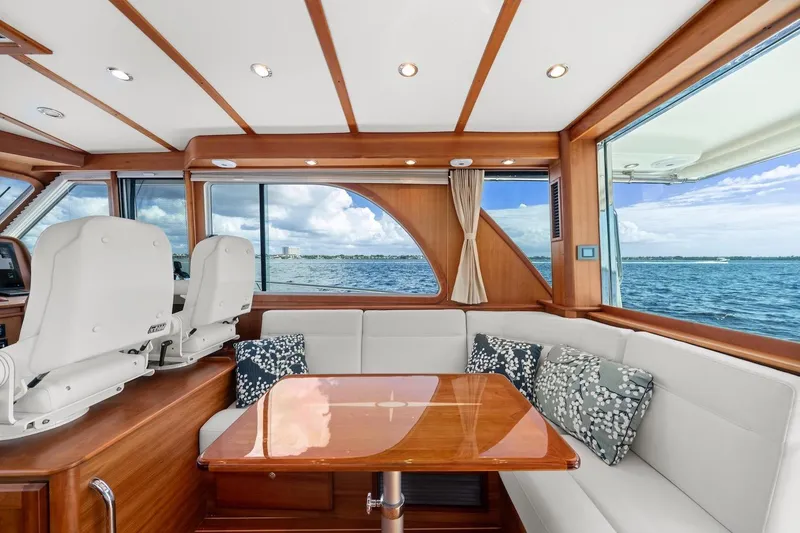 Slide: The Image of Interior of 2019 Sabre 45 Salon Express yacht with elegant seating and ocean view. - 13