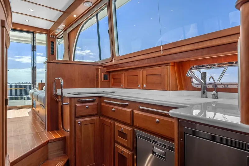 Slide: The Image of Luxurious interior of 2019 Sabre 45 Salon Express yacht with modern kitchen amenities. - 19