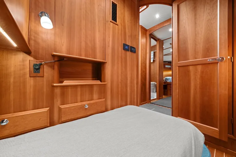 Slide: The Image of Luxurious 2019 Sabre 45 Salon Express interior with cozy bedroom and elegant bathroom. - 39