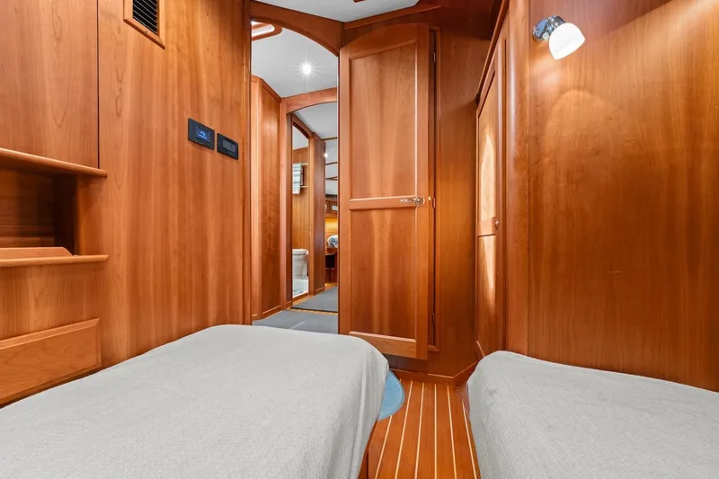 Slide: The Image of Luxurious bathroom in 2019 Sabre 45 Salon Express yacht with wood cabinetry and modern fixtures. - 40