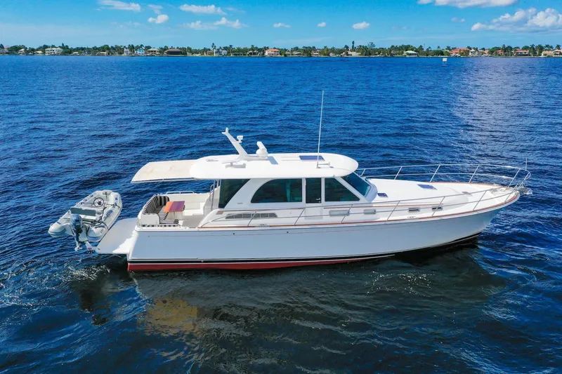 Slide: The Image of 2019 Sabre 45 Salon Express yacht cruising on open water. - 81