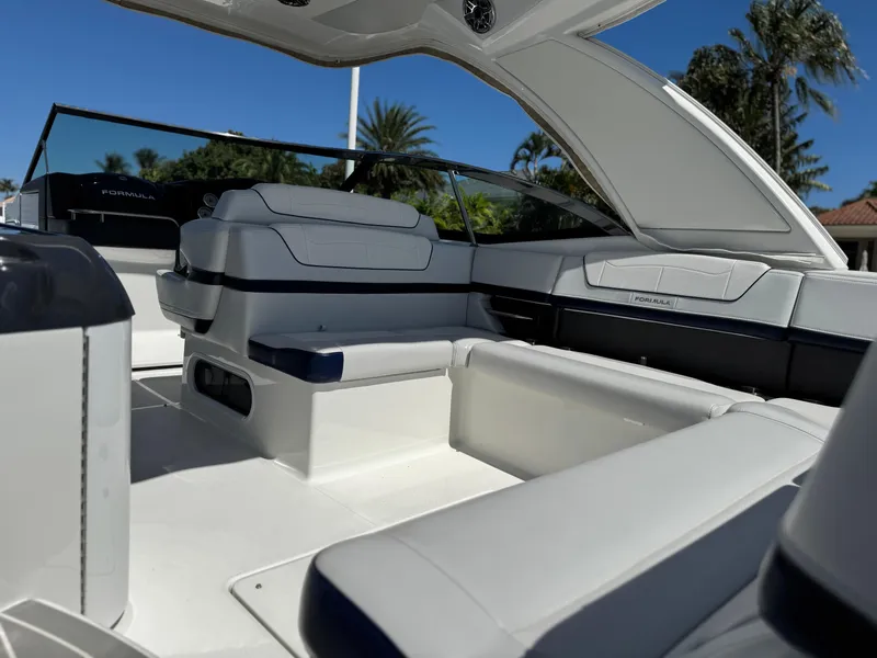 Slide: The Image of 2023 Formula 350 Crossover Bowrider interior with luxurious seating and sleek design. - 19