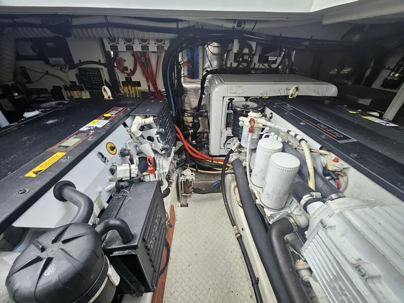 Slide: The Image of Engine room of 2008 Cruisers Yachts 390 Sports Coupe, showcasing mechanical components and systems. - 11