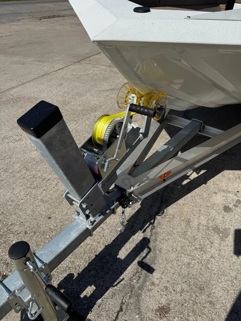 Slide: The Image of 2025 SeaArk Bay Runner 190 boat on trailer, close-up of winch and bow. - 13