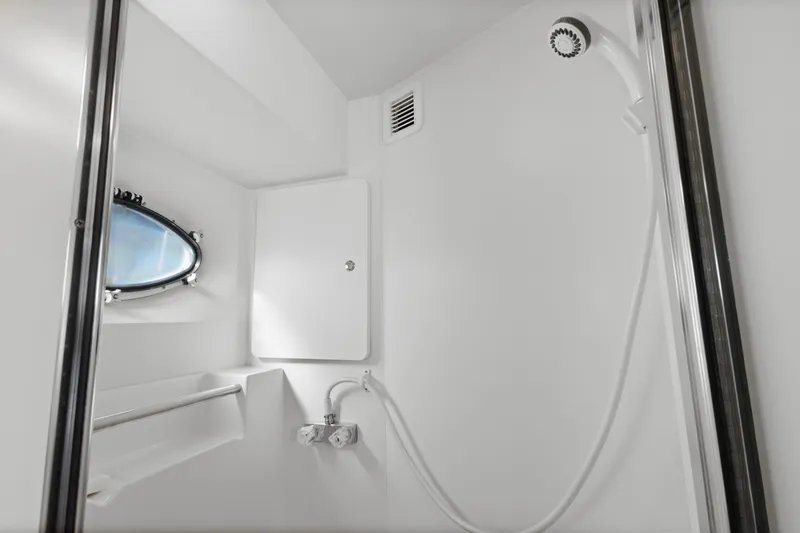 Slide: The Image of Luxurious bedroom interior of 2000 Silverton 392 Motor Yacht with cozy bed and wooden accents. - 19