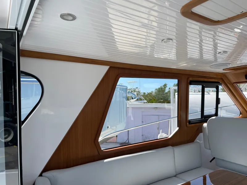 Slide: The Image of Interior of 2025 True North 34 Outboard Express, featuring sleek design and comfortable seating. - 22