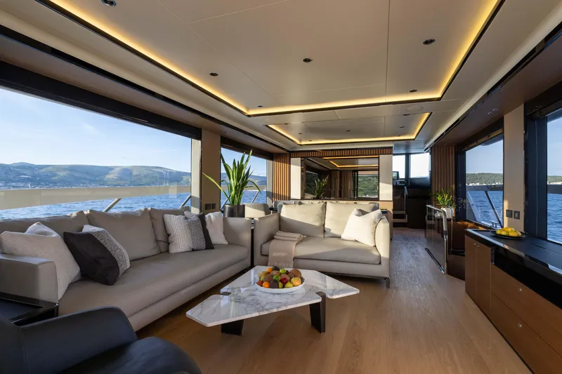 Slide: The Image of Luxurious interior of 2024 Absolute NAVETTA 75 yacht with elegant seating and panoramic views. - 40