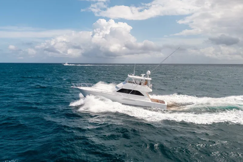 Slide: The Image of Viking 55 Convertible yacht cruising on open sea, 2000 model. - 9