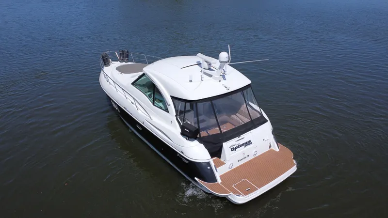 Slide: The Image of 2009 Cruisers Yachts 420 Sports Coupe on calm water, aerial view. - 7