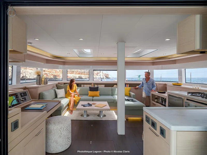 Slide: The Image of Luxurious interior of 2025 Lagoon 55 yacht with modern furnishings and ocean view. - 13