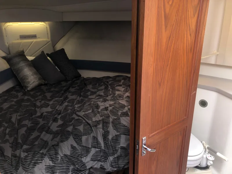 Slide: The Image of Cozy bedroom and bathroom in 1993 Carver 350 Aft Cabin yacht. - 20