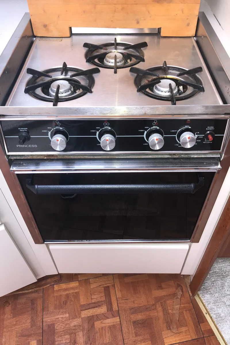 Slide: The Image of Stove and oven in 1993 Carver 350 Aft Cabin yacht kitchen. - 28