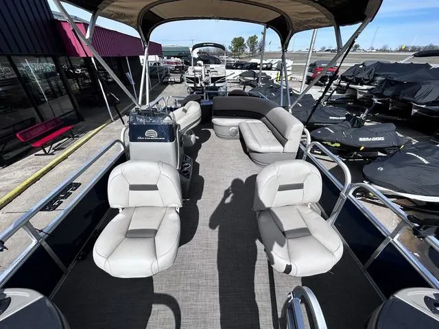 Slide: The Image of 2023 Sun Tracker BASS BUGGY® 18 DLX pontoon boat interior with seating and canopy. - 8