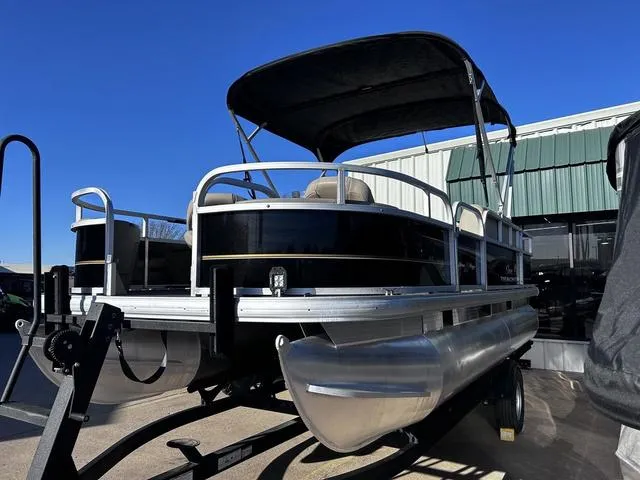 Slide: The Image of 2021 Sun Tracker BASS BUGGY® 18 DLX pontoon boat interior with steering console. - 10