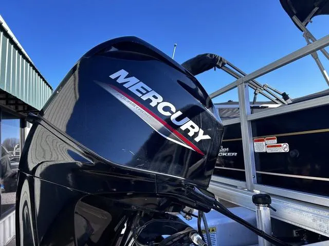 Slide: The Image of 2021 Sun Tracker BASS BUGGY® 18 DLX pontoon boat at dealership, rear view. - 5