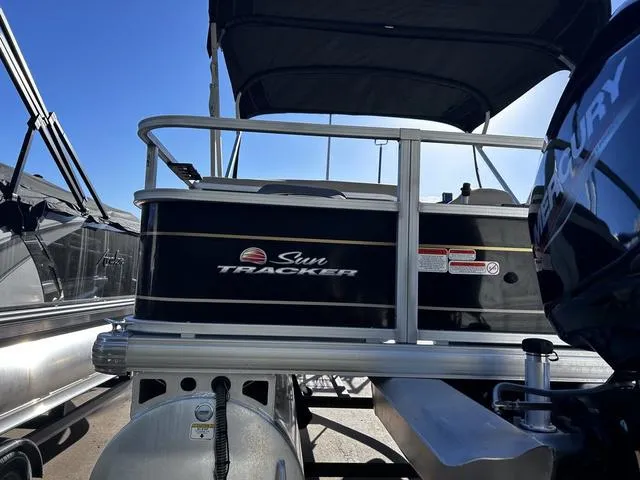 Slide: The Image of 2021 Sun Tracker BASS BUGGY® 18 DLX pontoon boat with spacious seating and canopy. - 7