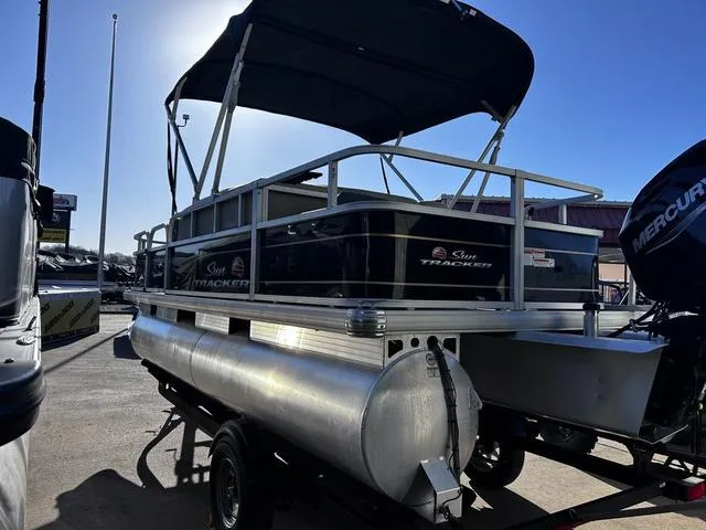 Slide: The Image of 2021 Sun Tracker BASS BUGGY® 18 DLX pontoon boat interior with seating and helm. - 8