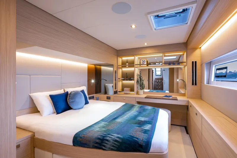 Slide: The Image of Luxurious interior of 2025 Lagoon 60 yacht with modern bedroom design. - 32