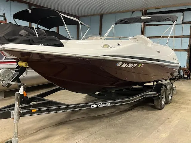 Slide: The Image of 2017 Hurricane SS202 boat on trailer in indoor storage facility. - 14