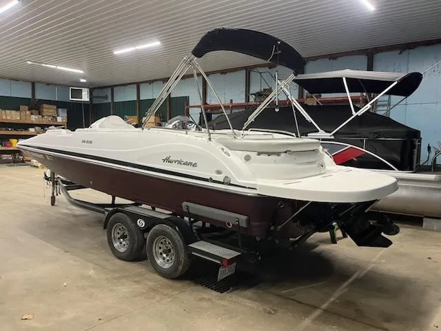 Slide: The Image of 2017 Hurricane SS202 boat on trailer in indoor storage facility. - 15