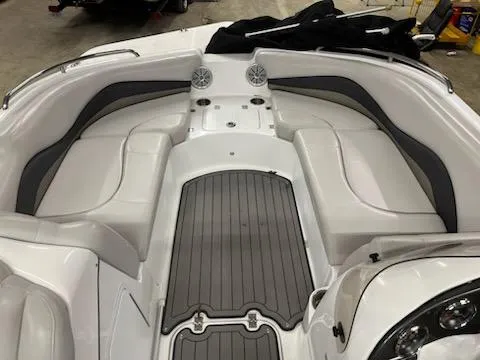 Slide: The Image of Interior of a 2017 Hurricane SS202 boat with white seating and gray flooring. - 21