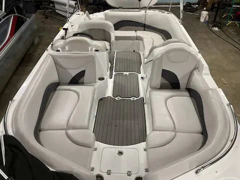 Slide: The Image of 2017 Hurricane SS202 boat interior with white seating and gray flooring. - 22