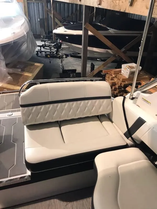 Slide: The Image of 2018 Regal 2800 Bowrider interior seating in a storage area. - 12