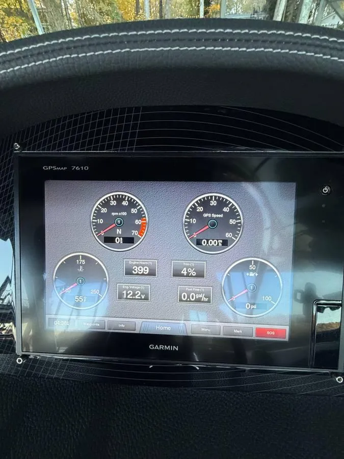 Slide: The Image of Garmin GPS display on 2018 Regal 2800 Bowrider dashboard showing gauges and metrics. - 23