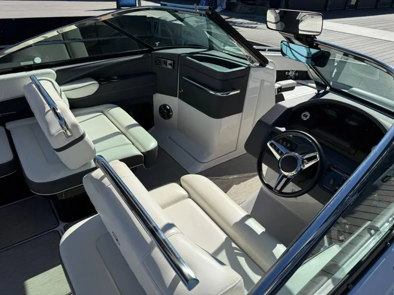 Slide: The Image of 2018 Regal 2800 Bowrider interior with sleek seating and modern dashboard design. - 4