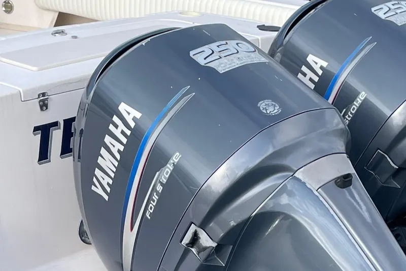 Slide: The Image of Yamaha 250 outboard engines on a 2005 Grady-White Marlin 300 boat. - 16