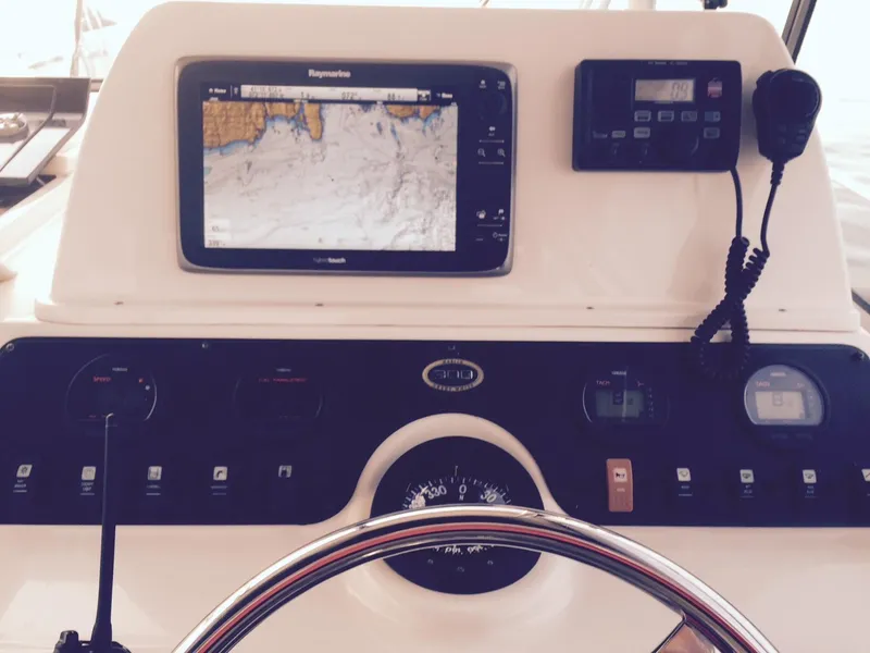 Slide: The Image of Control panel of 2005 Grady-White Marlin 300 boat with navigation equipment. - 17