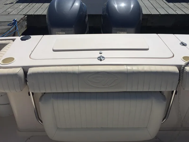 Slide: The Image of 2005 Grady-White Marlin 300 boat with dual Yamaha engines at dock. - 2