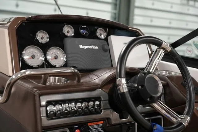Slide: The Image of Dashboard of a 2016 Formula Boats 290 Bowrider with Raymarine navigation system. - 15