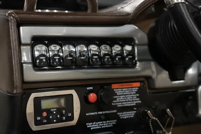 Slide: The Image of Control panel of 2016 Formula Boats 290 Bowrider with switches and display. - 16