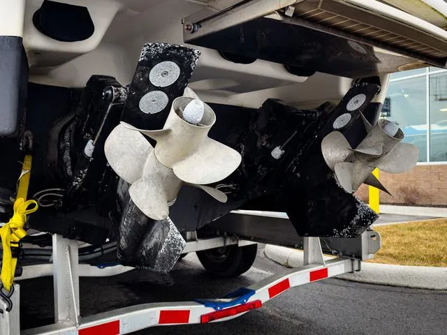 Slide: The Image of 2016 Formula Boats 290 Bowrider propellers on trailer, close-up view. - 2