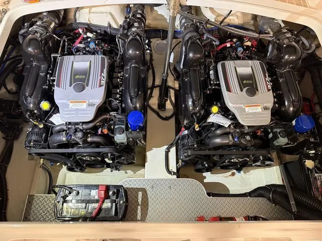 Slide: The Image of Engine compartment of a 2016 Formula Boats 290 Bowrider, featuring dual engines and battery. - 27